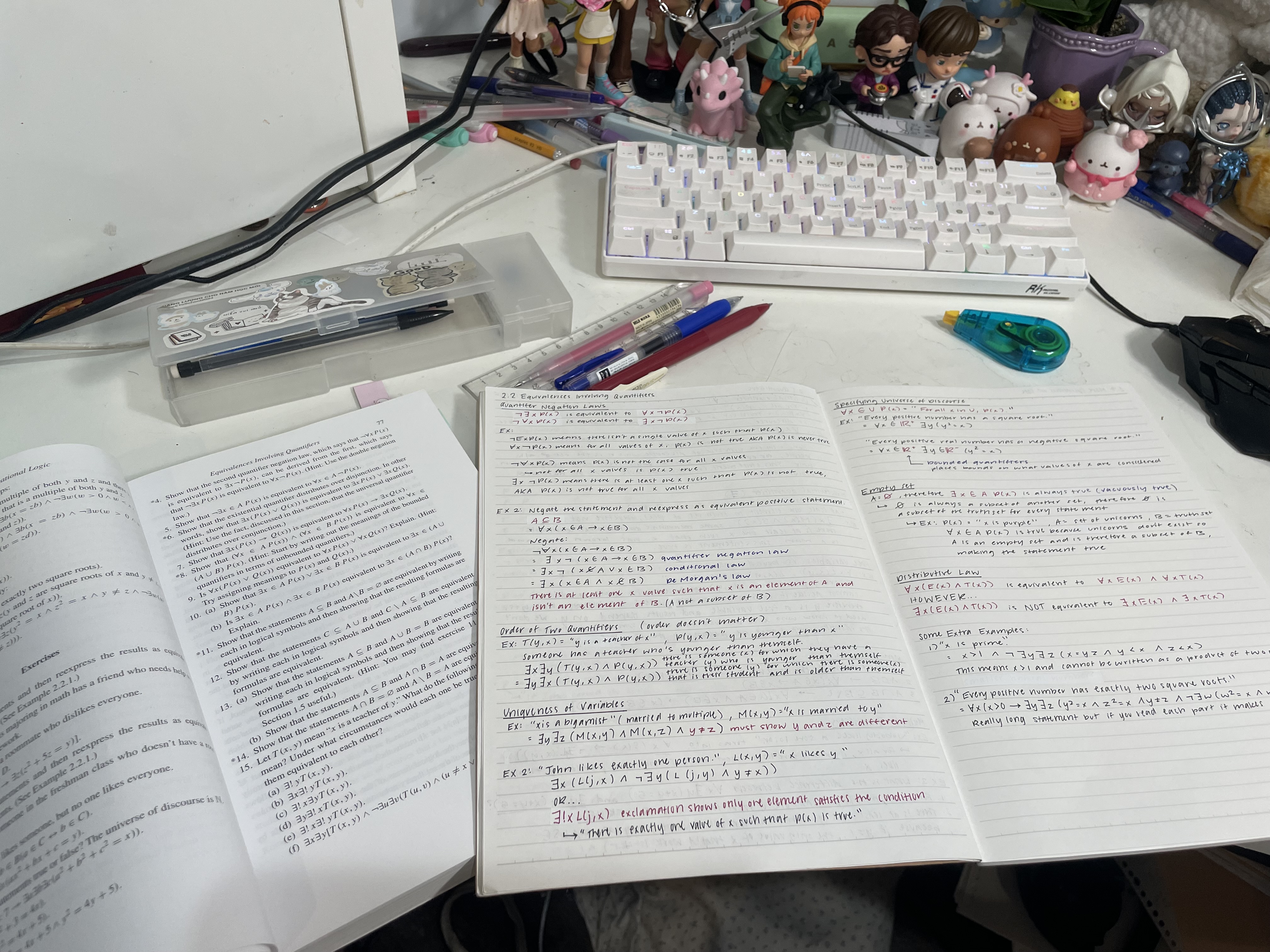 kimberly's desk with her notebook and proofs book